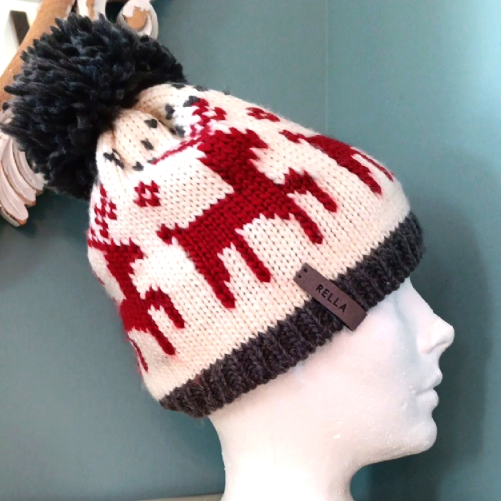 ^ Rella Knitted Reindeer Pom-Pom Toque Hat